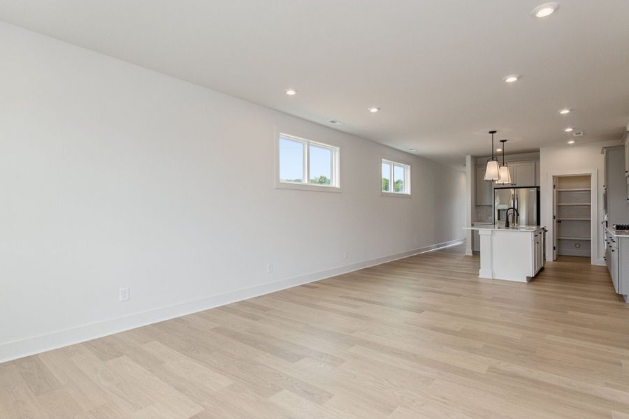 Representative unfurnished interior of a home built from the Lumen C by Homes by Dickerson in Chatham Park, Pittsboro (Image 12).