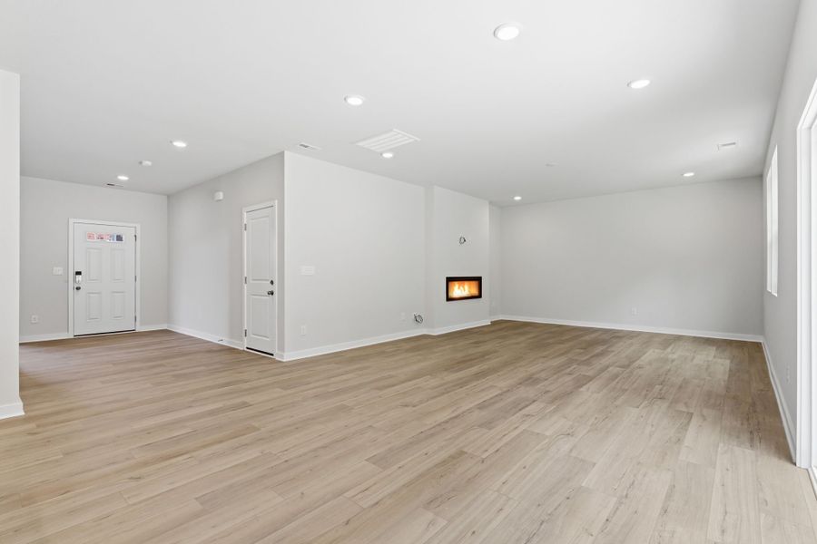 A room with wood floors.