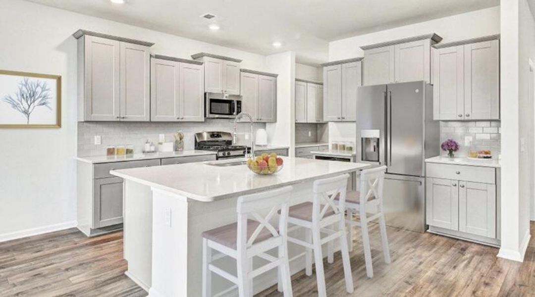 Furnished interior view inside a new home in Sweetgrass at Summers Corner, Summerville (Image 10).