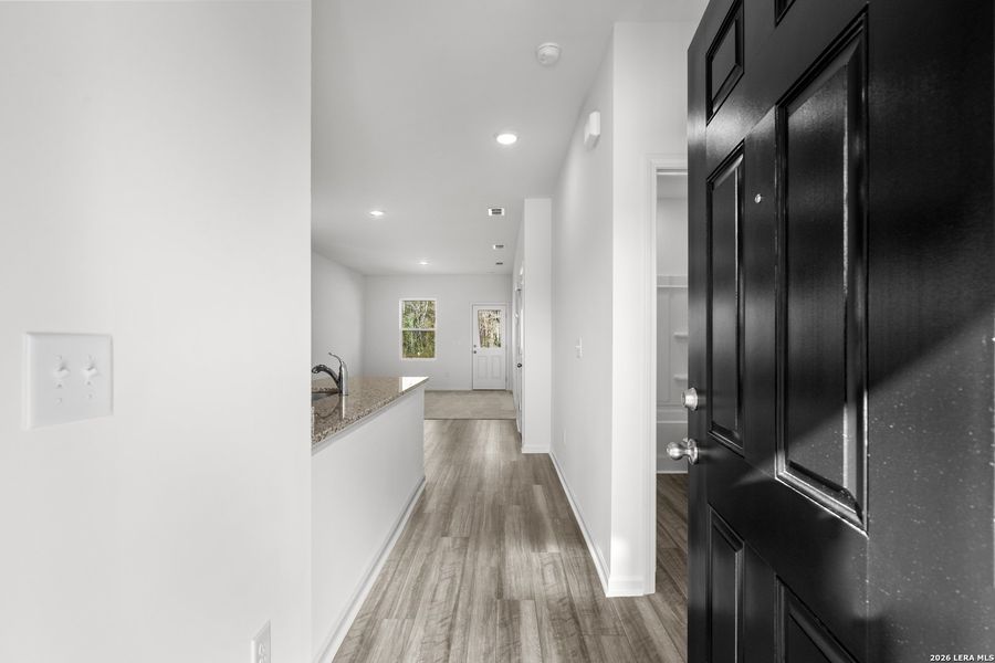 Furnished interior view inside a new home in Sutton Farms, San Antonio (Image 12).