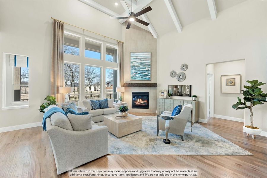 Living room with vaulted beamed ceiling, fireplace, hardwood floors, and large windows Living room with vaulted beamed ceiling, fireplace, hardwood floors, and large windows