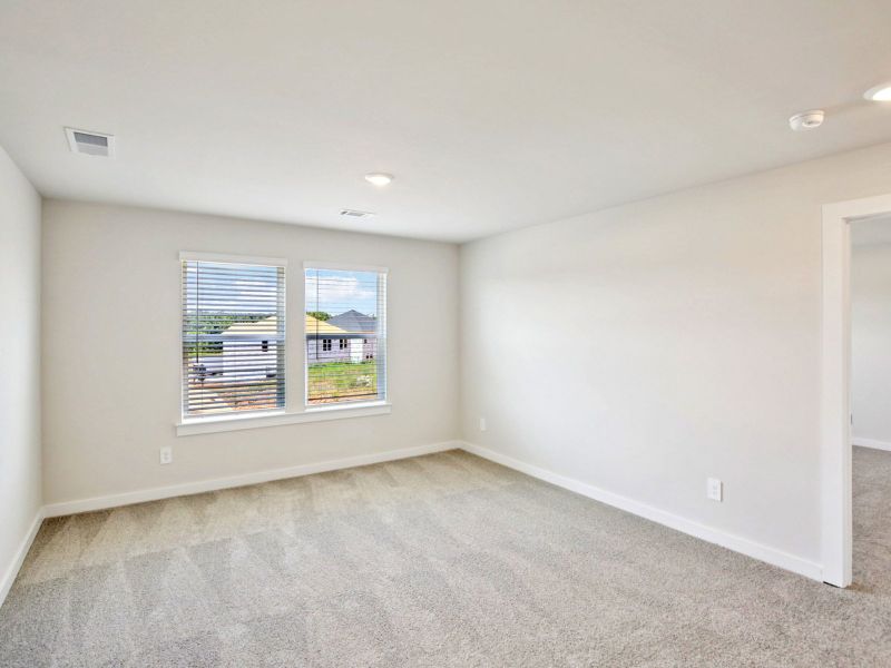 The upstairs loft gives the kids a place to study.