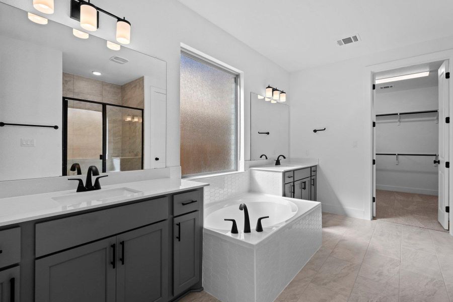 Primary Bath retreat with dual vanities & garden tub
