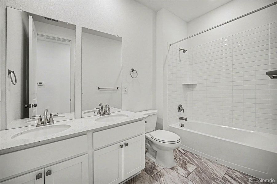 Furnished interior view inside a new home in Red Rocks Ranch, Morrison (Image 9).
