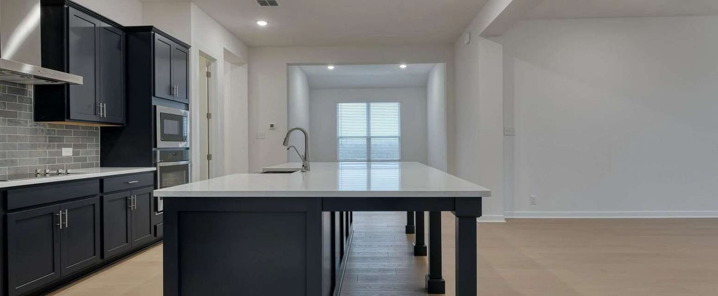 Representative furnished interior of a home built from the Blanco by Ashton Woods in Saddlebrook Ranch, Schertz (Image 10).
