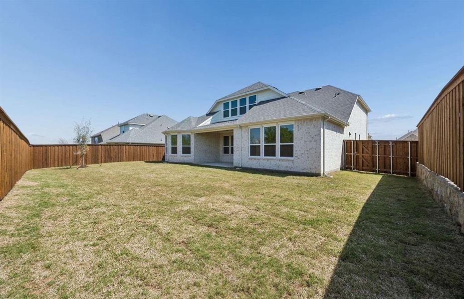 Spacious fenced-in backyard
