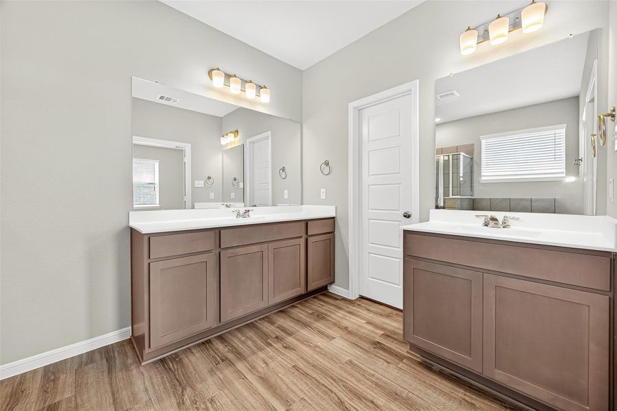 Furnished interior view inside a new home in Sunterra, Katy (Image 8).