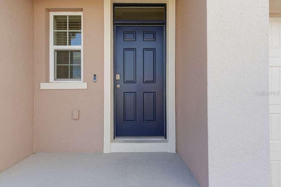 Exterior details and patio area of a home in Brentwood, Davenport (Image 4).