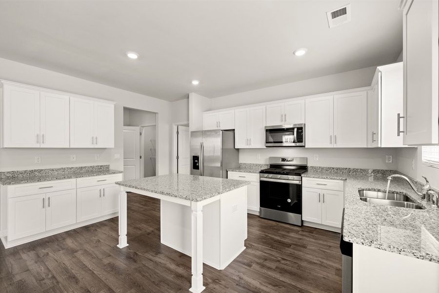 Representative furnished interior of a home built from the Mansfield by D.R. Horton in Southwind Village, Evans (Image 7).