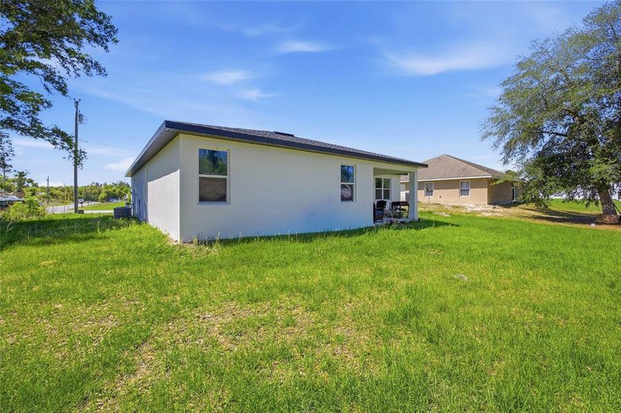 Exterior details and patio area of a home in , Ocala (Image 4).