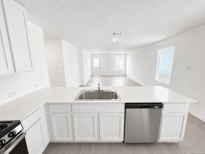 Furnished interior view inside a new home in Sapphire Grove, San Antonio (Image 9).