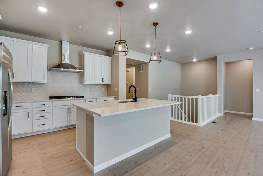 Furnished interior view inside a new home in Reunion, Commerce City (Image 8).
