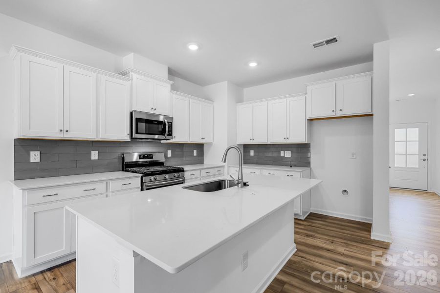 Furnished interior view inside a new home in Cannon Village, York (Image 7).