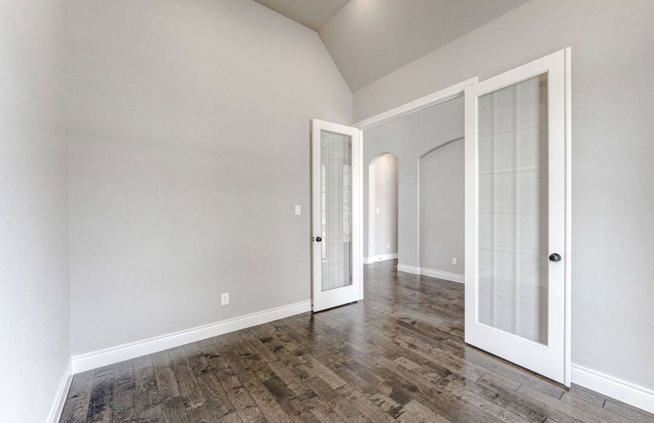 Representative unfurnished interior of a home built from the 3799 by Ravenna Homes in Artavia 70′, Conroe (Image 22).