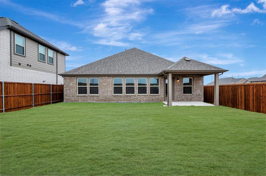 Exterior details and patio area of a home in The Preserve, Justin (Image 24). Exterior details and patio area of a home in The Preserve, Justin (Image 24).