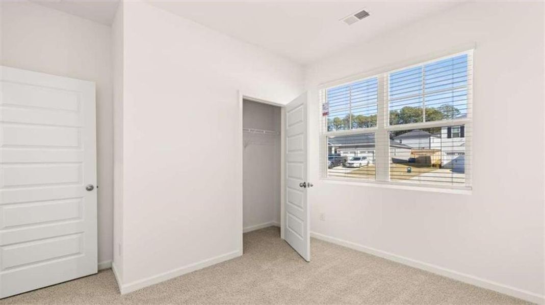 Spacious, unfurnished interior of a new home in Oakchase at Hampton, Hampton (Image 33).
