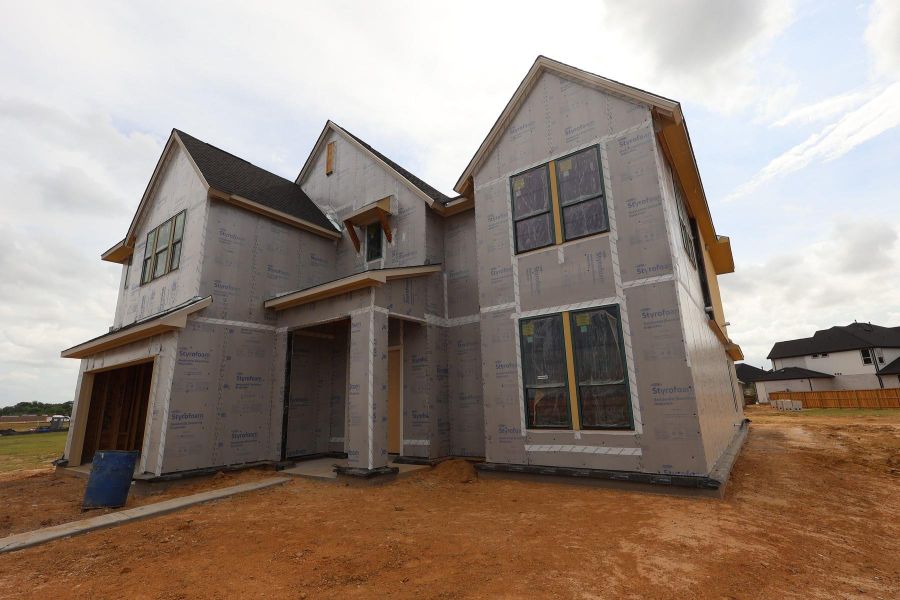 In-progress construction of a new home in Dunham Pointe, Cypress, TX (Image 3).