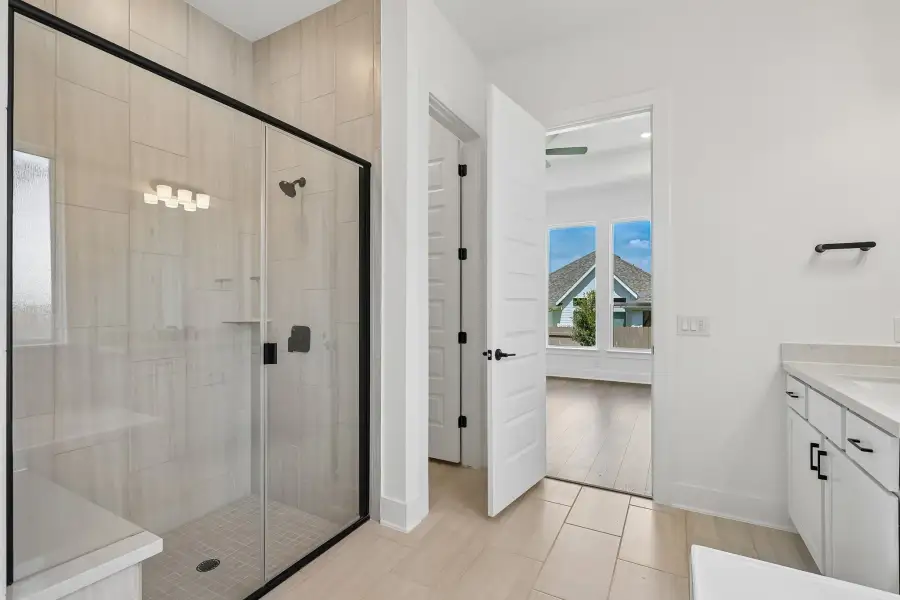 Representative furnished interior of a home built from the Guadalupe by Taylor Morrison in Eastwood, Manor (Image 19).