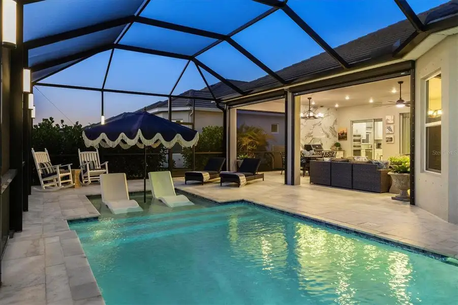 Exterior details and patio area of a home in Esplanade at Azario Lakewood Ranch, Bradenton (Image 24).