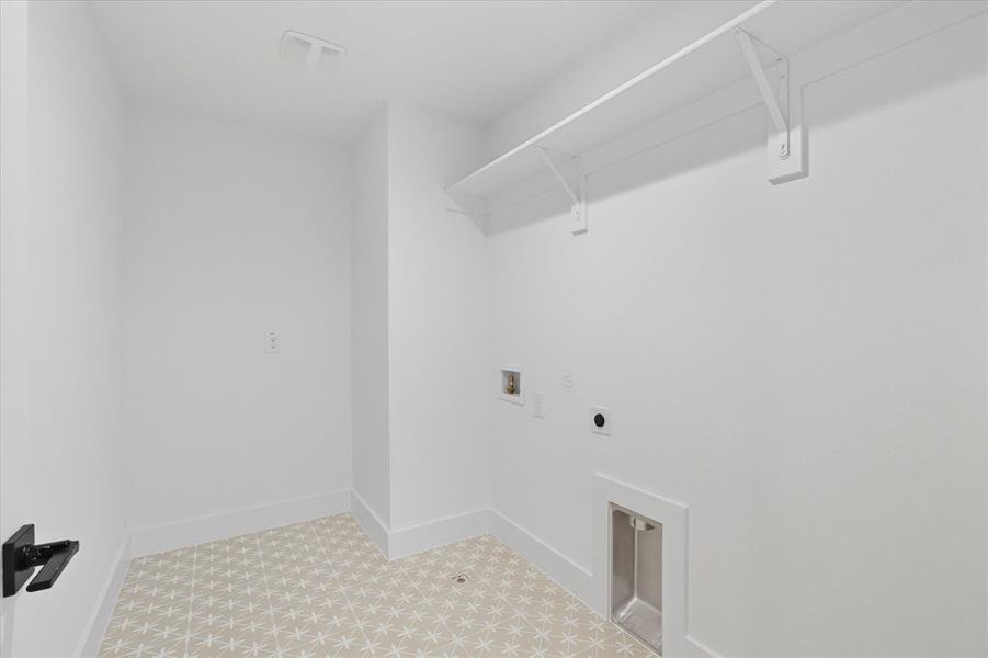 Laundry area featuring hookup for a washing machine and electric dryer hookup