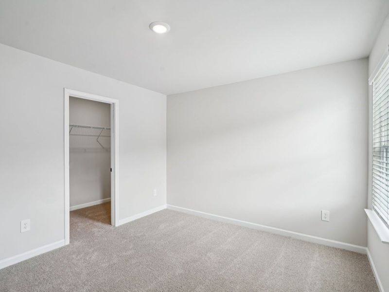 The Taylorsville floorplan with the Divine White interior package.