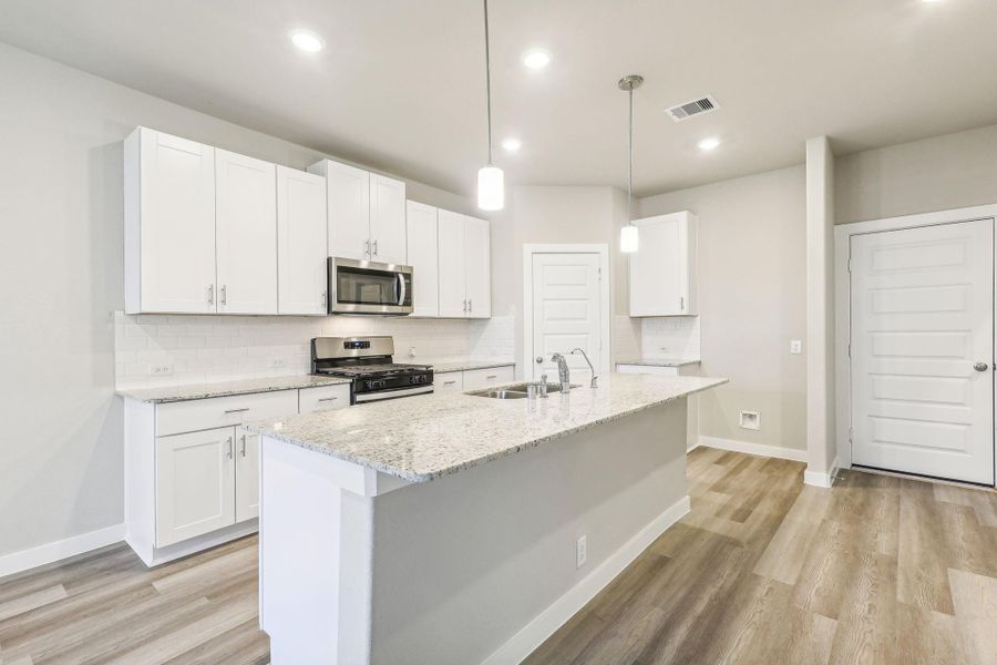 Photo is not of the actual home, but is an inspirational photo of builder’s model home and may depict options, furnishings, and/or decorator features that are not included