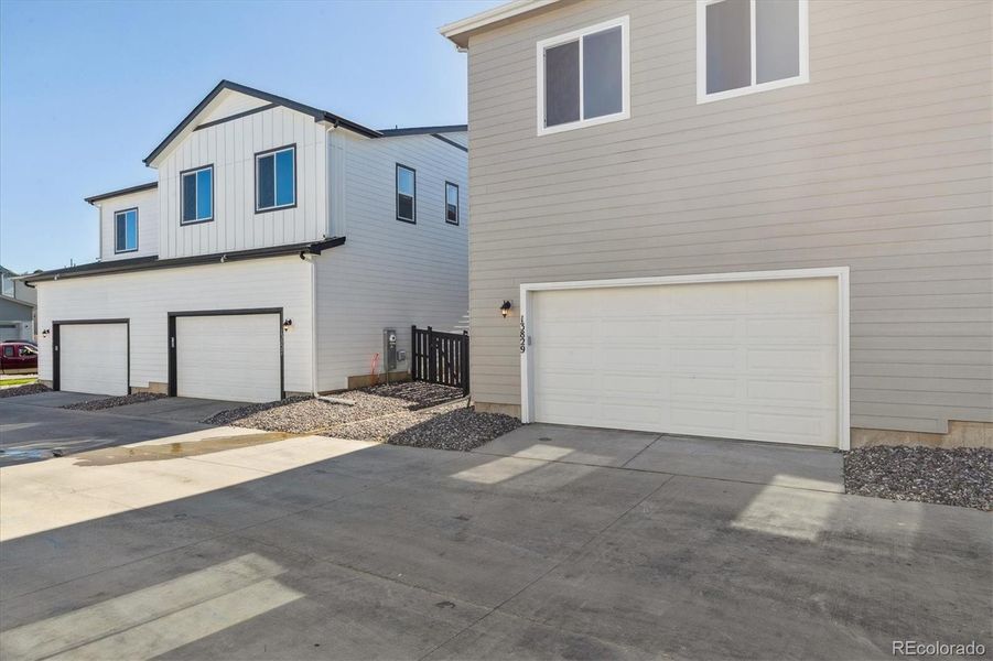 Exterior details and patio area of a home in Paired Homes at Alder Creek, Parker (Image 4).