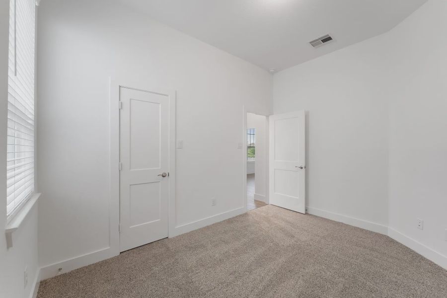 Image 53 representing the Augusta by Chesmar Homes in Riceland Alley Loads, Mont Belvieu, TX.