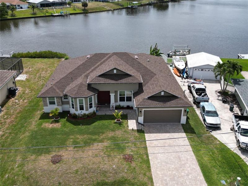 Front exterior of a new home in , Port Charlotte, FL, highlighting curb appeal (Image 19).