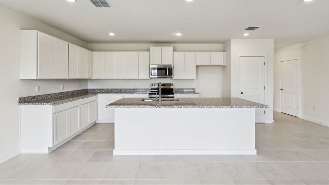 Representative furnished interior of a home built from the Baker by DRB Homes in Willowbrook North, Winter Haven (Image 12).