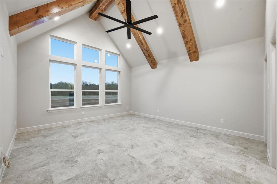 Bonus room featuring high vaulted ceiling, beam ceiling, ceiling fan, and recessed lighting Bonus room featuring high vaulted ceiling, beam ceiling, ceiling fan, and recessed lighting