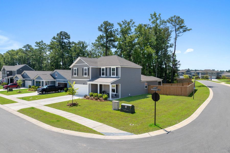 Front exterior of a new home in , Summerville, SC, highlighting curb appeal (Image 2). Front exterior of a new home in , Summerville, SC, highlighting curb appeal (Image 2).