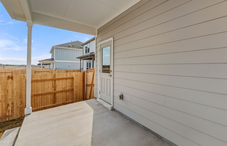 Exterior details and patio area of a home in Patterson Ranch, Georgetown (Image 21).