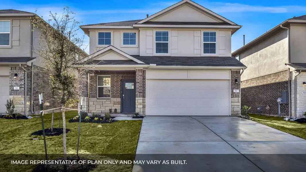 Front exterior of a new home in Carillon, Manor, TX, highlighting curb appeal (Image 2). Front exterior of a new home in Carillon, Manor, TX, highlighting curb appeal (Image 2).