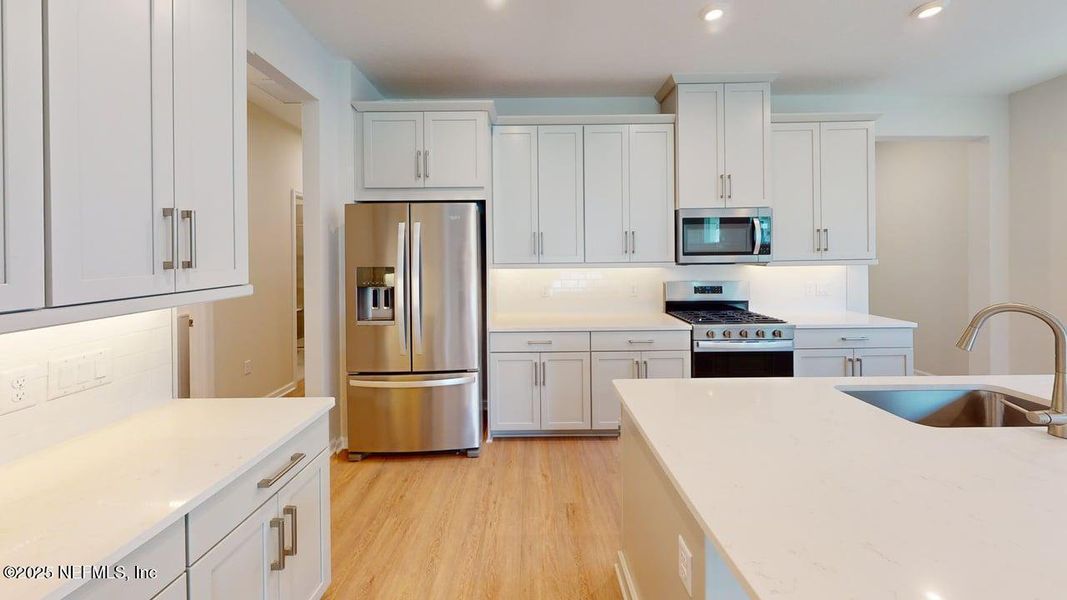 Furnished interior view inside a new home in RiverTown - WaterSong, St. Johns (Image 9). Furnished interior view inside a new home in RiverTown - WaterSong, St. Johns (Image 9).