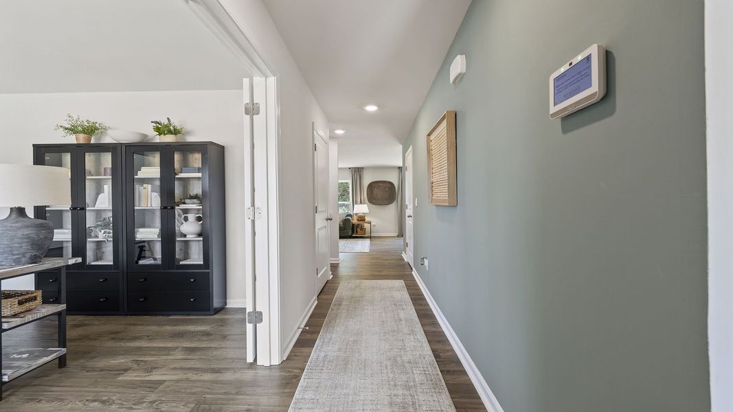 Furnished interior view inside a new home in Bentley Park, Greenwood (Image 6).