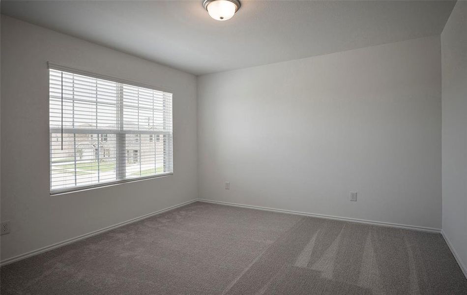 *floorplan representation, not actual home - Spacious secondary bedroom with large windows