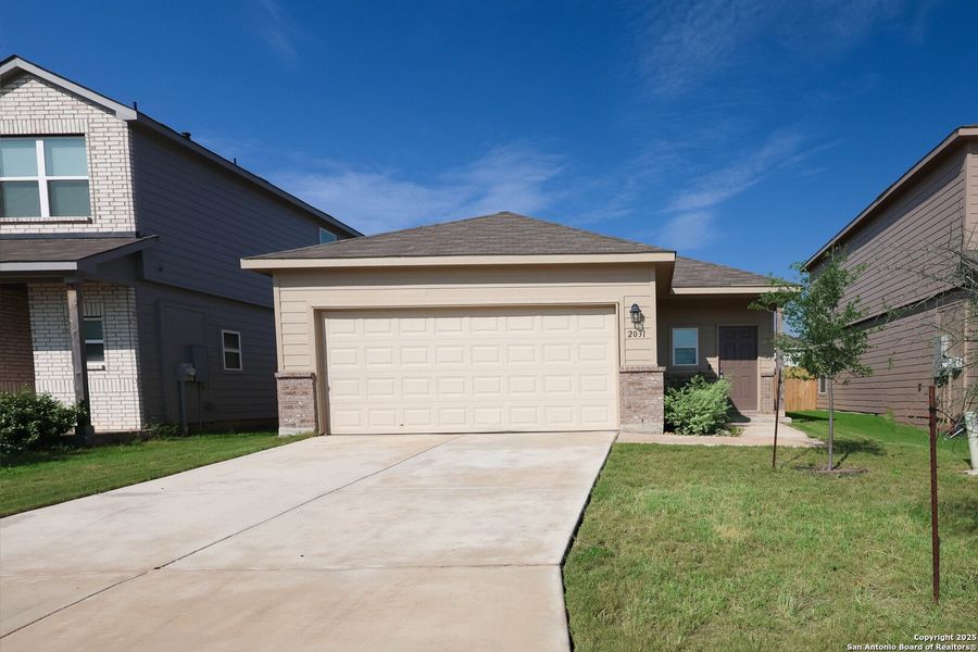 Front exterior of a new home in , Converse, TX, highlighting curb appeal (Image 1). Front exterior of a new home in , Converse, TX, highlighting curb appeal (Image 1).