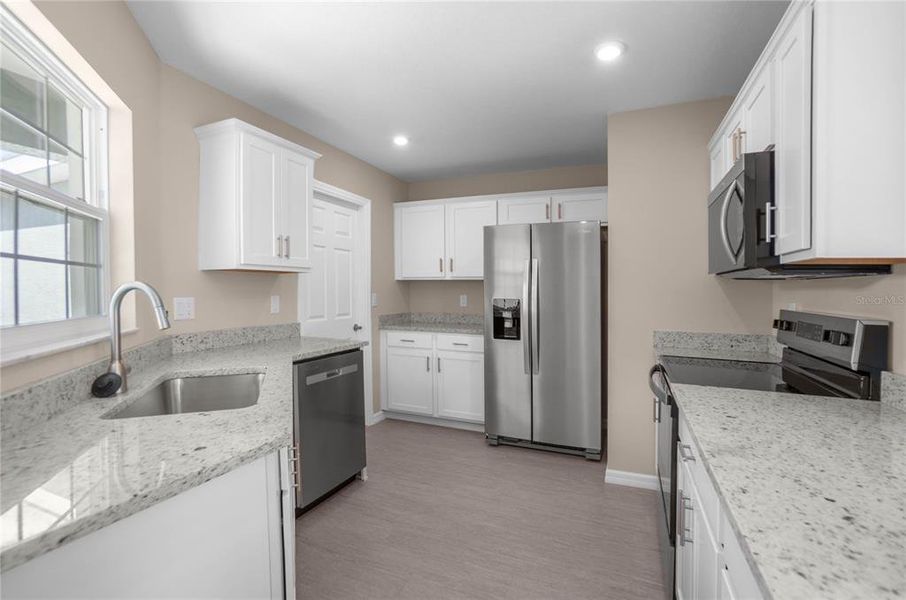 Furnished interior view inside a new home in , Floral City (Image 6).