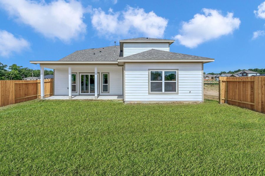 Exterior details and patio area of a home in Lexington Heights 50', Willis (Image 2). Exterior details and patio area of a home in Lexington Heights 50', Willis (Image 2).