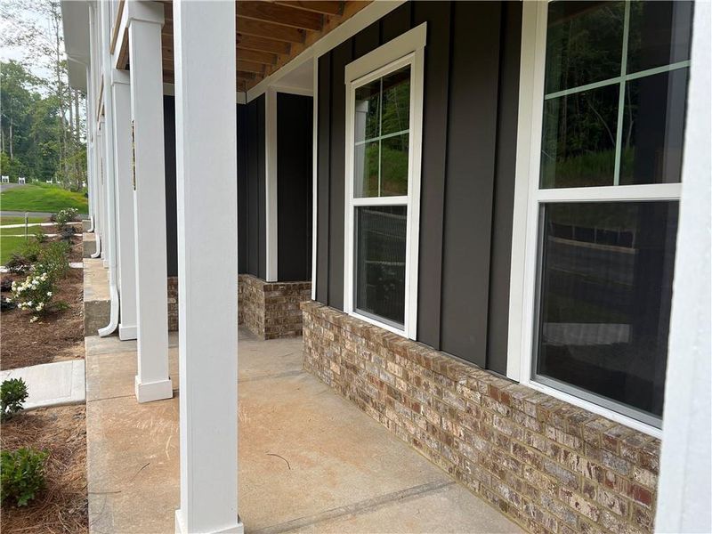 Front exterior of a new home in The Park at Gainesville Township, Gainesville, GA, highlighting curb appeal (Image 28). Front exterior of a new home in The Park at Gainesville Township, Gainesville, GA, highlighting curb appeal (Image 28).
