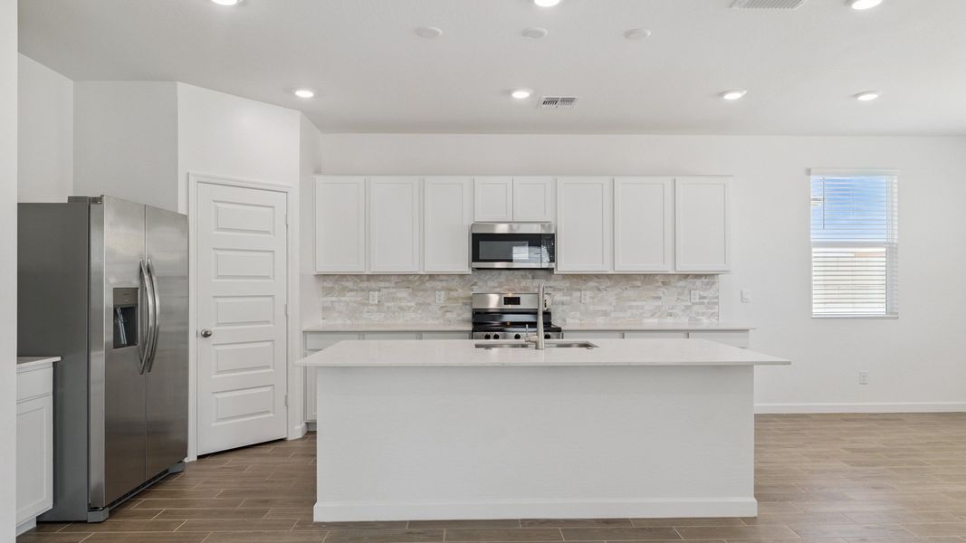 Representative furnished interior of a home built from the Crow by D.R. Horton in Zanjero Pass, Glendale (Image 15).