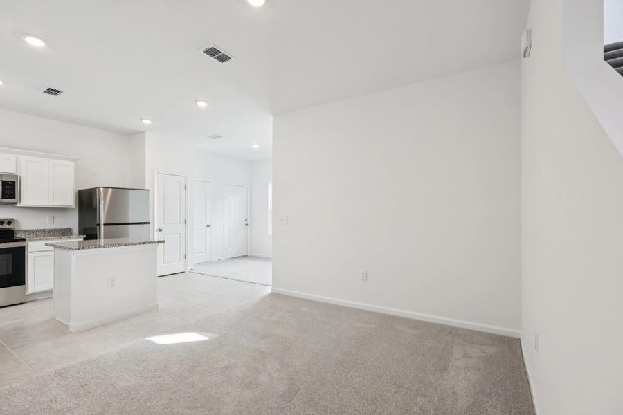 Representative unfurnished interior of a home built from the Keele by Starlight Homes in Hawks Run, Kissimmee (Image 19).
