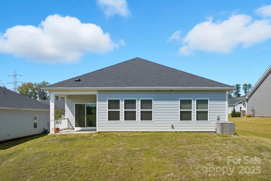 Exterior details and patio area of a home in Solena at the Vineyards II, Charlotte (Image 2). Exterior details and patio area of a home in Solena at the Vineyards II, Charlotte (Image 2).