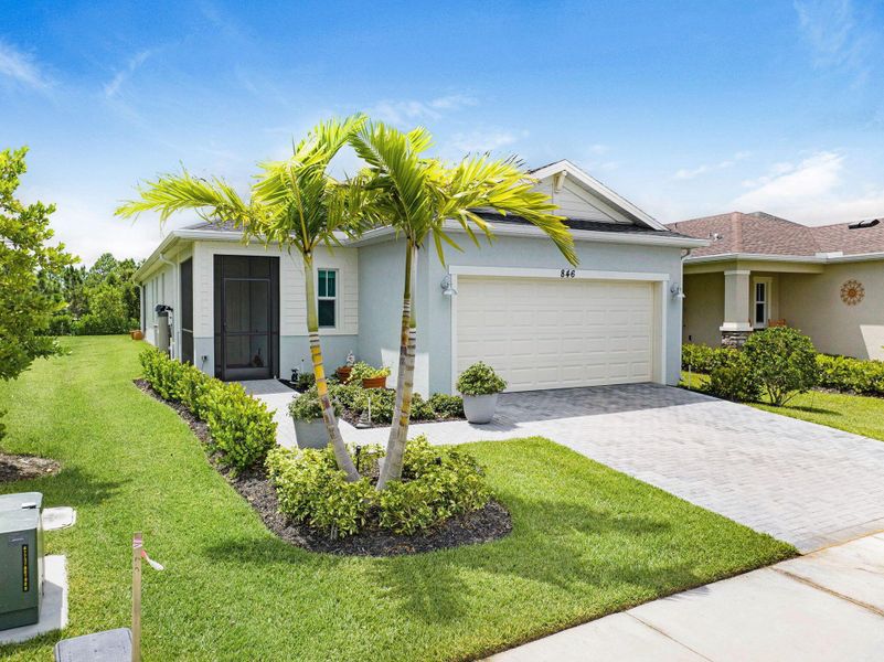 Front exterior of a new home in , Melbourne, FL, highlighting curb appeal (Image 19). Front exterior of a new home in , Melbourne, FL, highlighting curb appeal (Image 19).