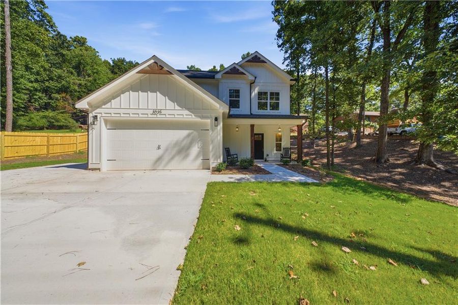 Front exterior of a new home in , Cumming, GA, highlighting curb appeal (Image 2). Front exterior of a new home in , Cumming, GA, highlighting curb appeal (Image 2).