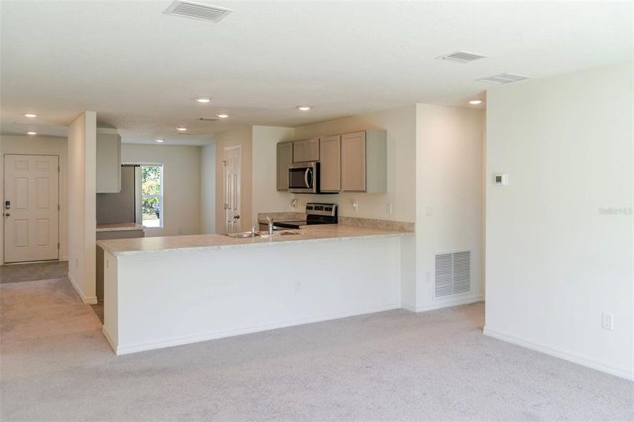 Furnished interior view inside a new home in , Palm Coast (Image 30).