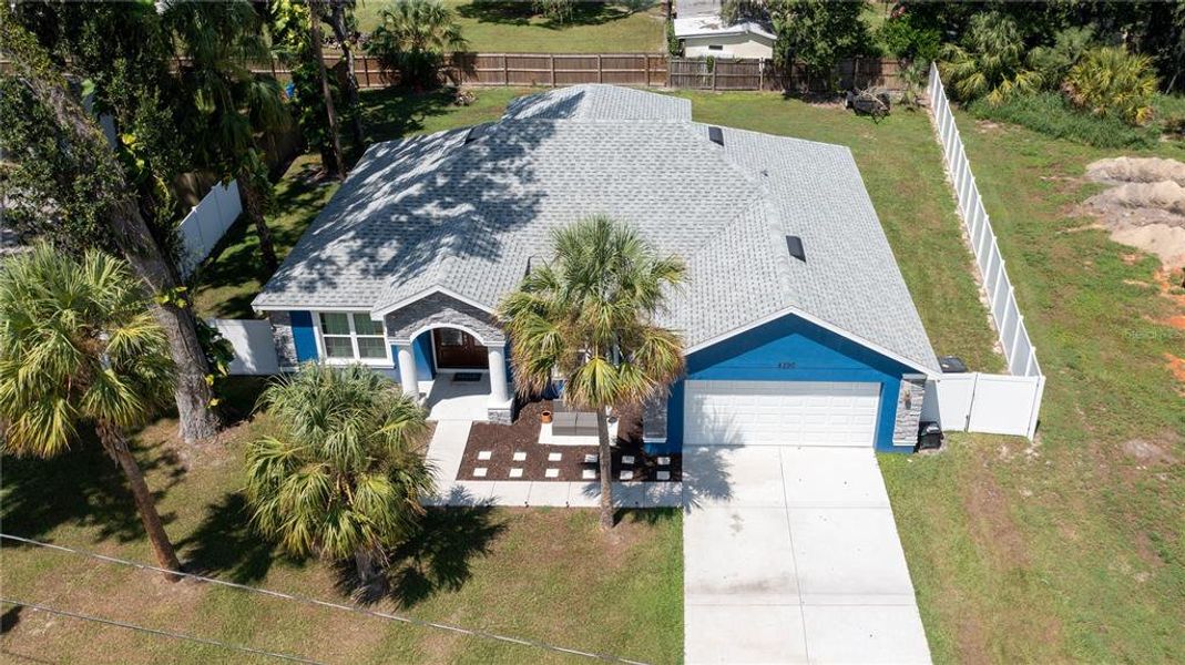 Front exterior of a new home in , Mulberry, FL, highlighting curb appeal (Image 24).
