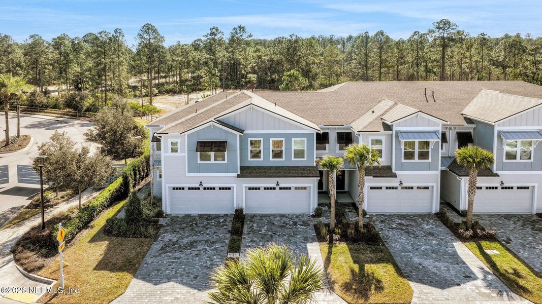 Front exterior of a new home in , Jacksonville, FL, highlighting curb appeal (Image 24).