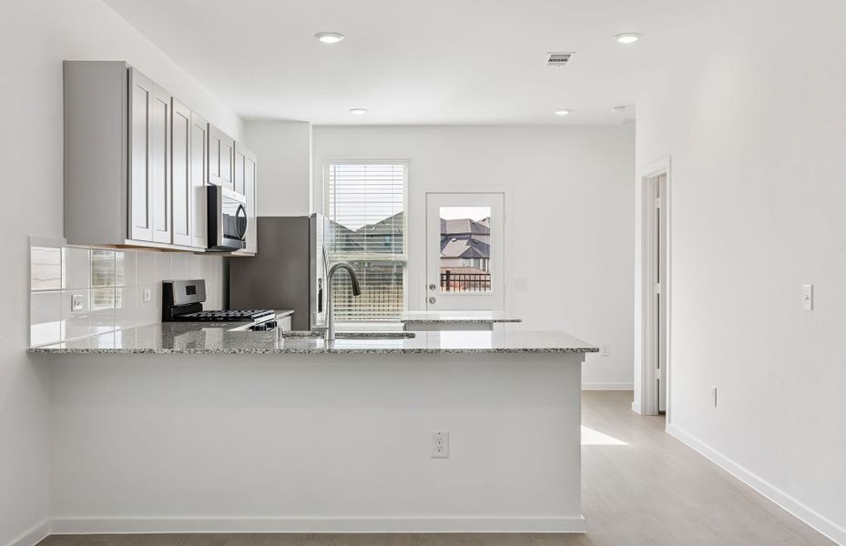 Furnished interior view inside a new home in Mavera, Conroe (Image 10).